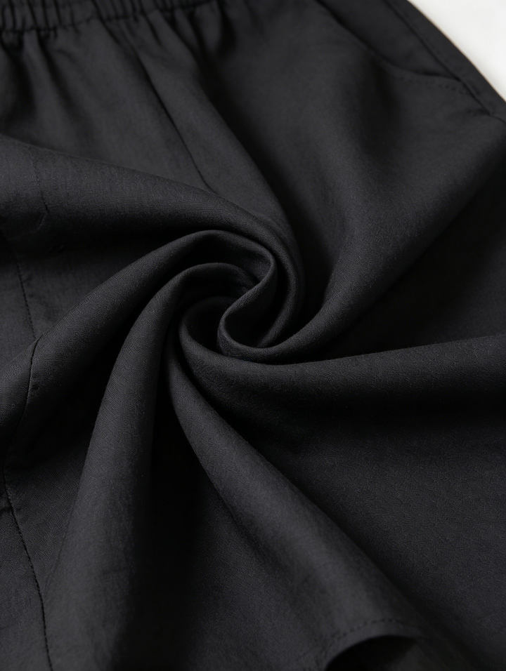Neralia - Tuta leggera con scollo Bardot