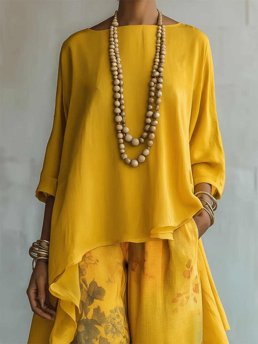 Anwyn - Coordinato con top in chiffon a strati e pantaloni a gamba larga